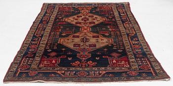 An Oriental rug, c. 282 x 154 cm.