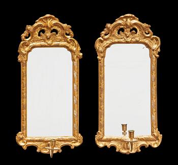 1585. A pair of Swedish Rococo 18th century one-light mirror girandoles.