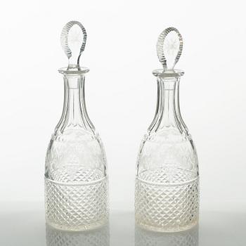 Two glass decanters, around the year 1900.