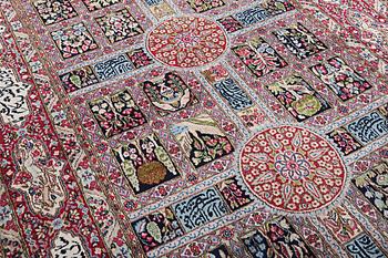 A carpet, semi-antique/old Kerman, figural, c. 273 x 164 cm.