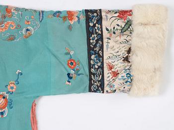 An embroidered silk and fur winter coat, late Qing dynasty (1644-1912).