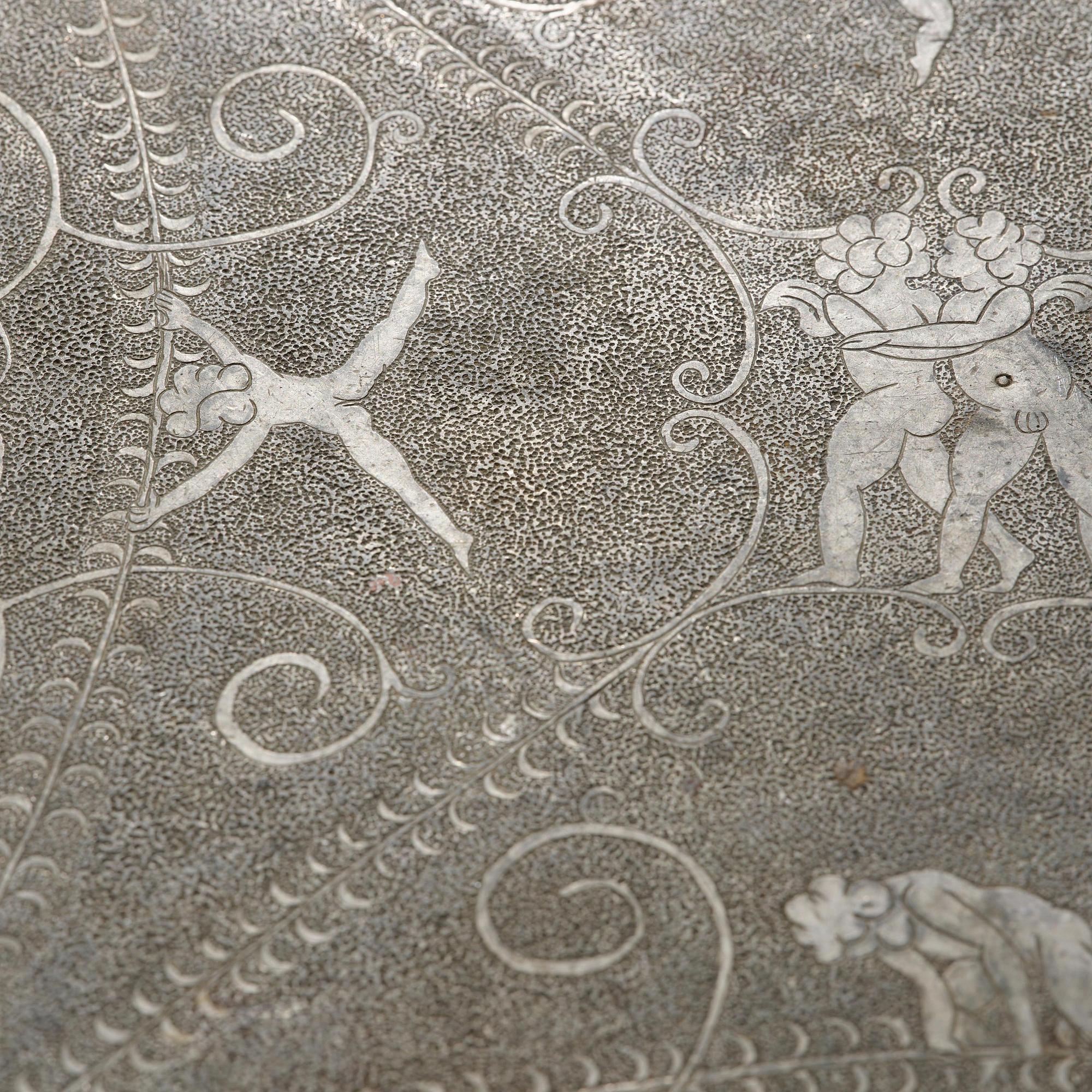 Anna Petrus, a pewter top tray table on a base by Uno Åhrén, executed in her studio, Stockholm, ca 1922-25.