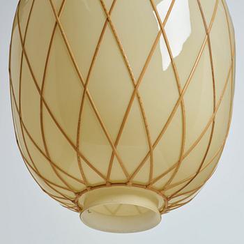 A pair of Swedish vanilla coloured glass ceiling lights with fretted rattan, 1930-40's.