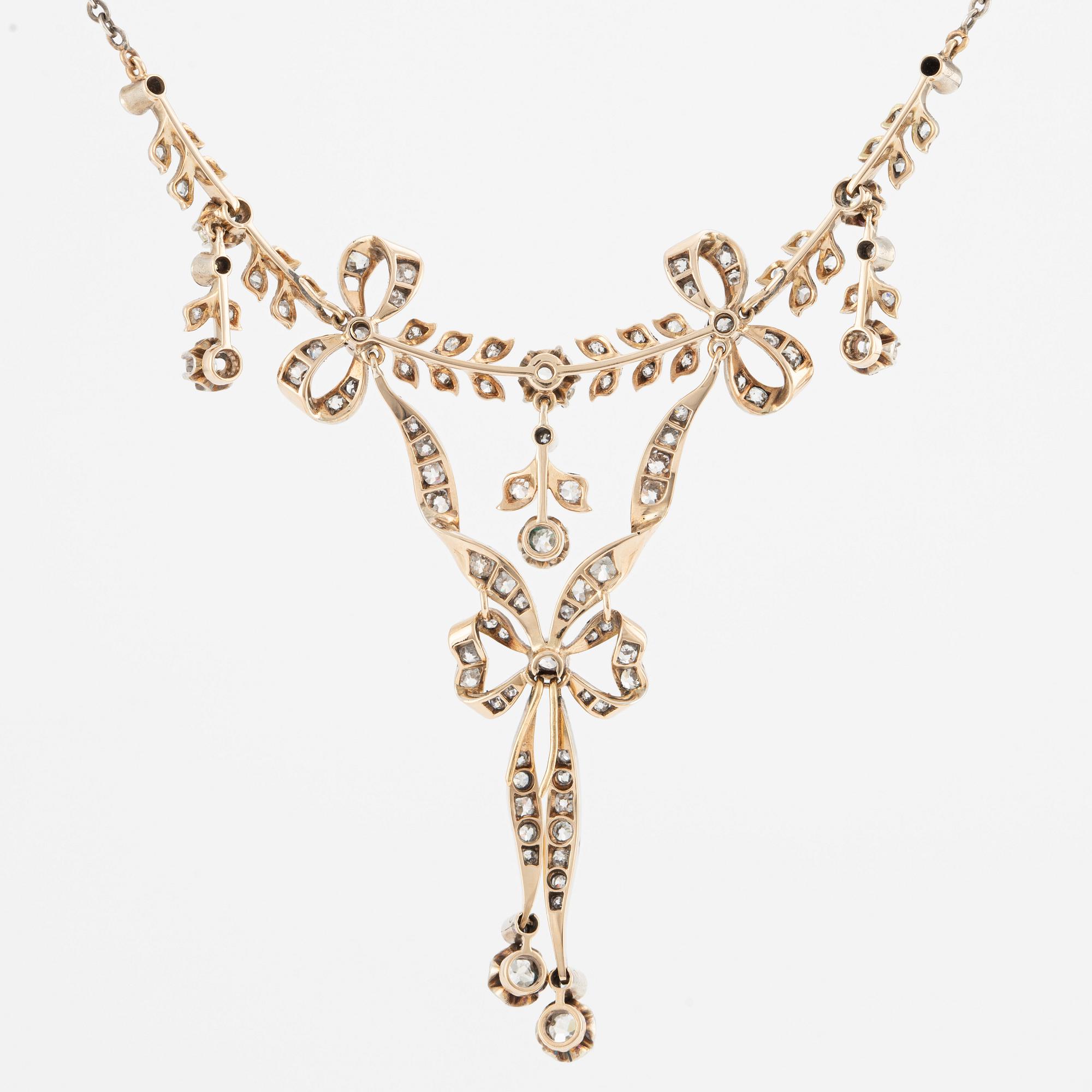 A necklace 14K gold and silver with old-cut diamonds.