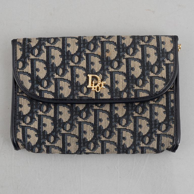 Christian Dior, a handbag/clutch.