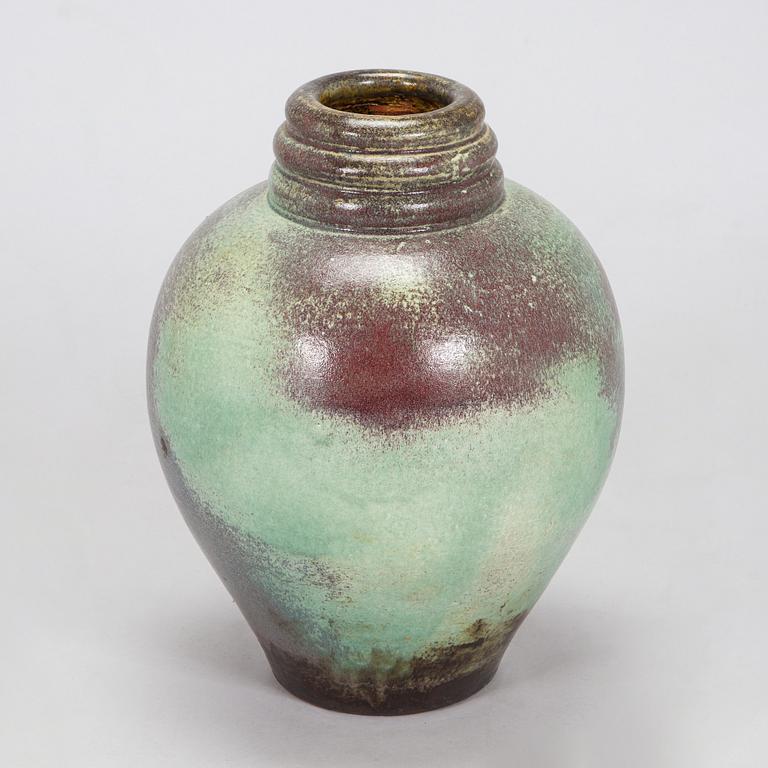 Heidi Blomstedt, a red clay floor vase, signed and dated -36.