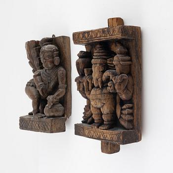 Two Indian carved wooden reliefs, around 1900.