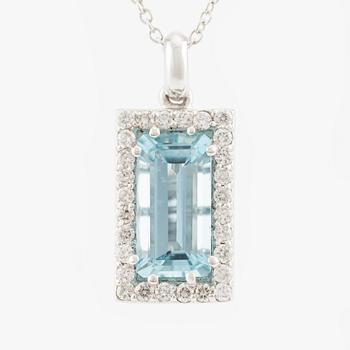 Pendant with chain in 18K gold set with a faceted aquamarine and round brilliant-cut diamonds.