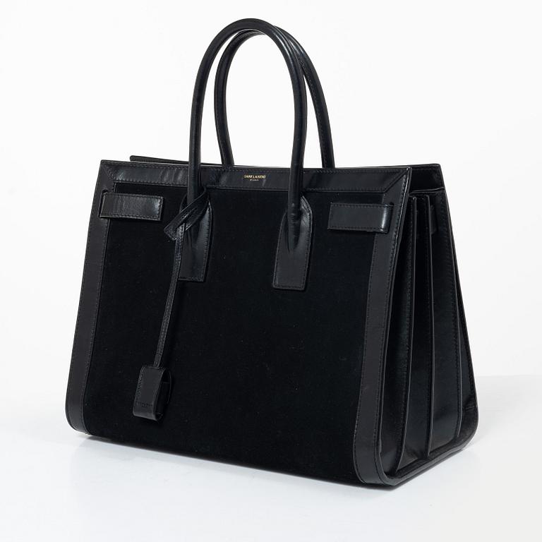 Yves Saint Laurent, a 'Sac du Jour' handbag.