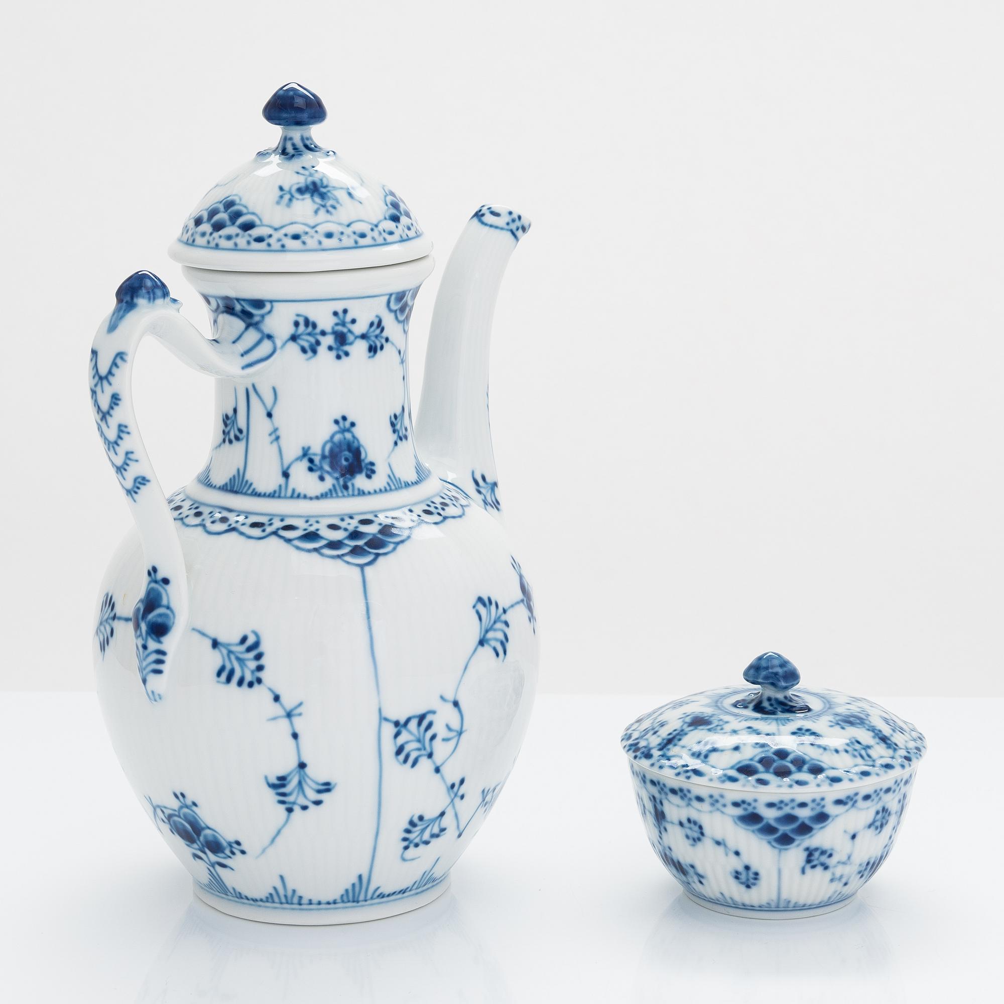 A 31-piece Royal Copenhagen 'Musselmalet' porcelain coffee set.
