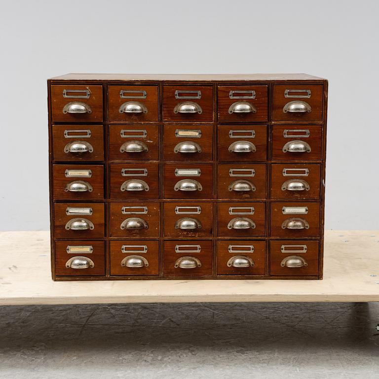 A pine cabinet with drawers, first half of the 20th Century.