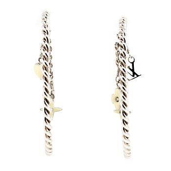 LOUIS VUITTON, a pair of charm earrings.