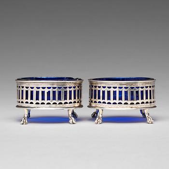 A pair of Swedish 18th century silver and blue glass salt cellars, mark of Pehr Zethelius, Stockholm 1791.