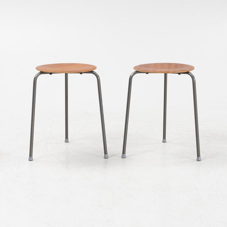A set of five teak veneered stools, second half of the 20th Century.