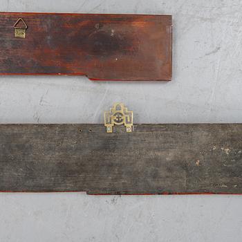 Two Chinese red lacquered wooden panels, 20th century.