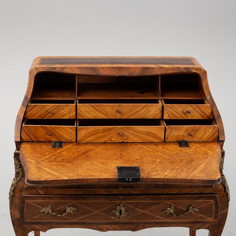 A rococo secretaire, second half of the 18th Century.