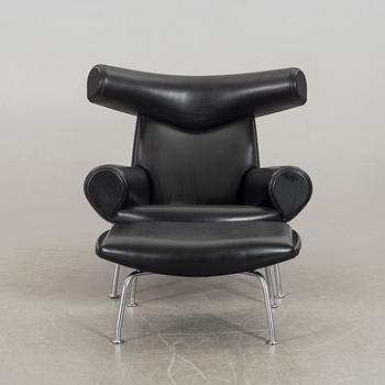 HANS J WEGNER, "Ox chair" lounge chair and stool.