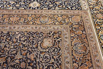 A Kashan carpet, c. 383 x 310 cm.