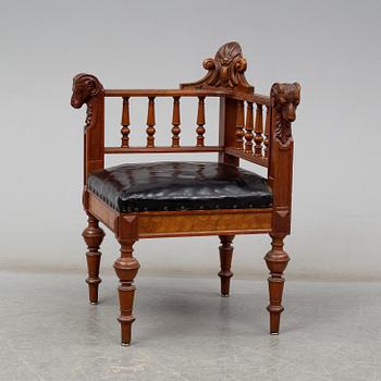 A late 19th century writing desk and armchair.