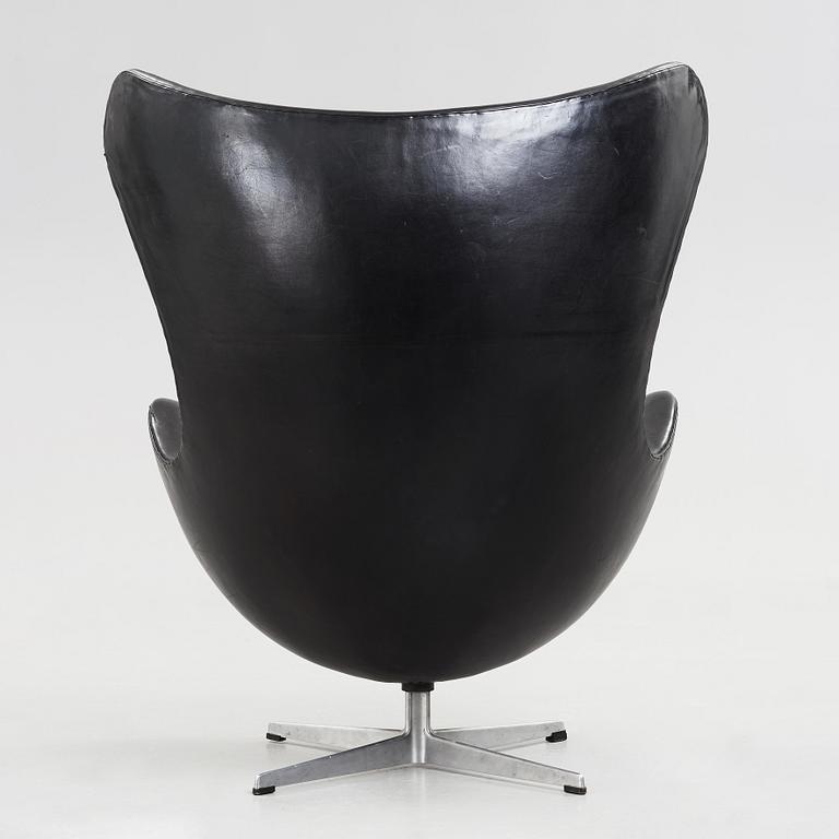 An Arne Jacobsen black leather 'Egg' chair, Fritz Hansen, Denmark 1960's.