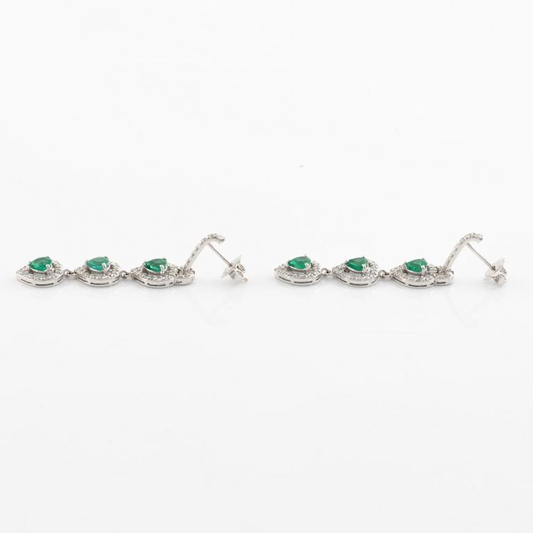 Emerald and brilliant cut diamond earrings.