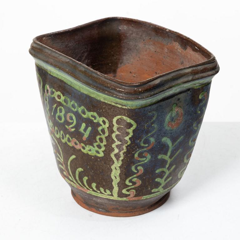 Stoneware planter and stand, dated 1824.