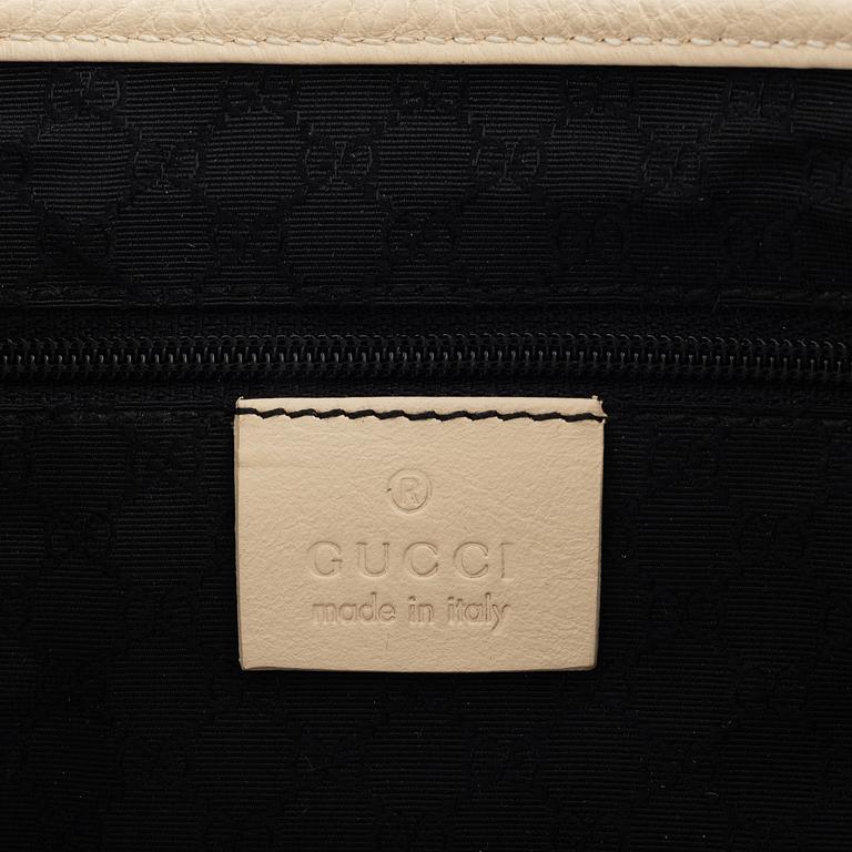 Gucci, a 'Jackie' leather handbag.