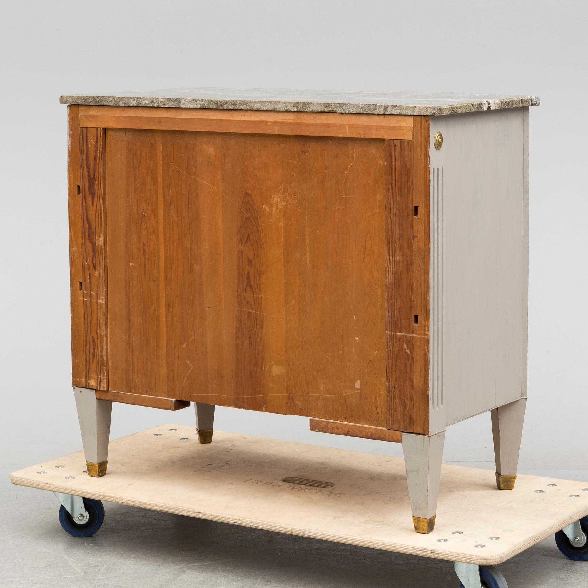 an early 20th century chest of drawers.