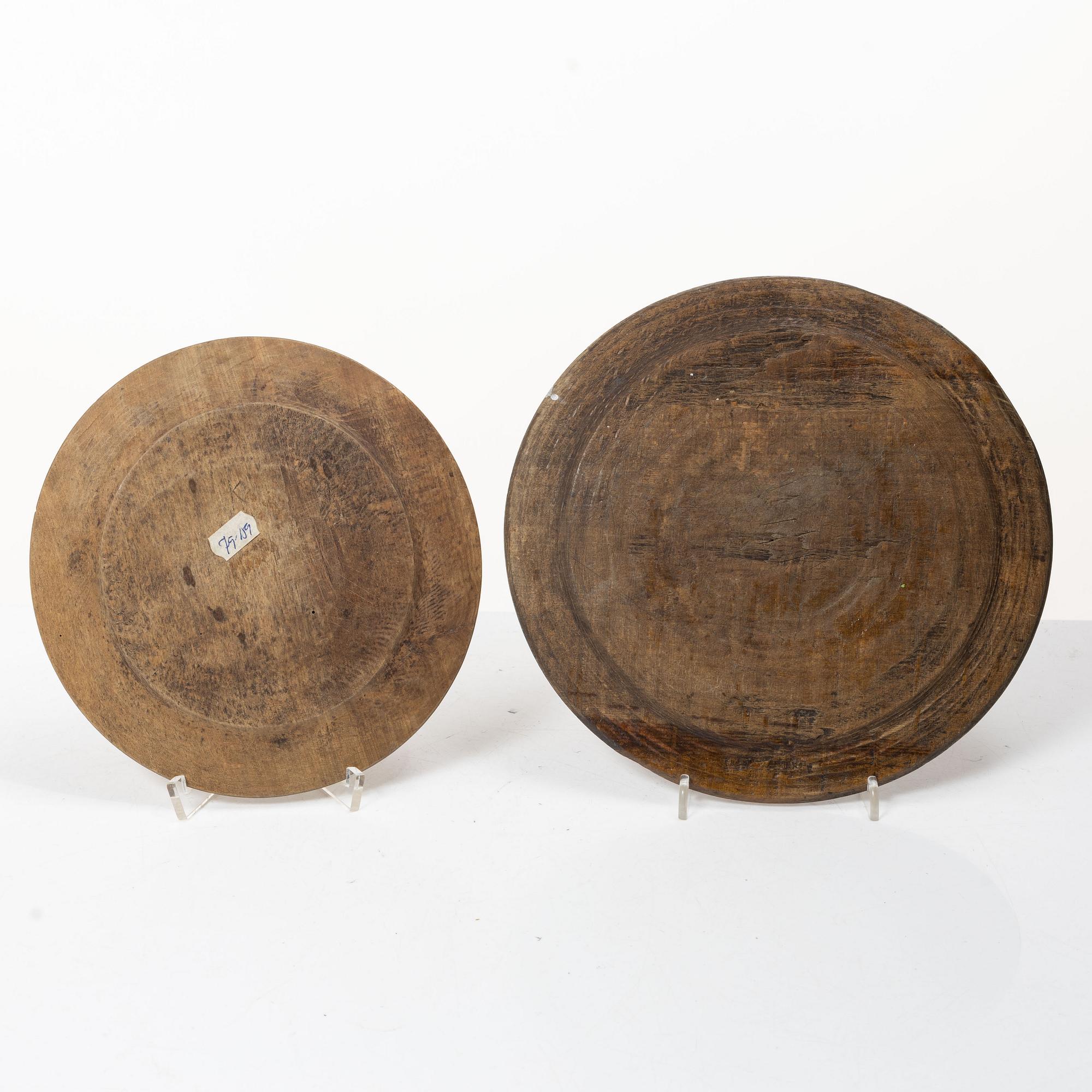 Twelve wooden plates, 19th Century.