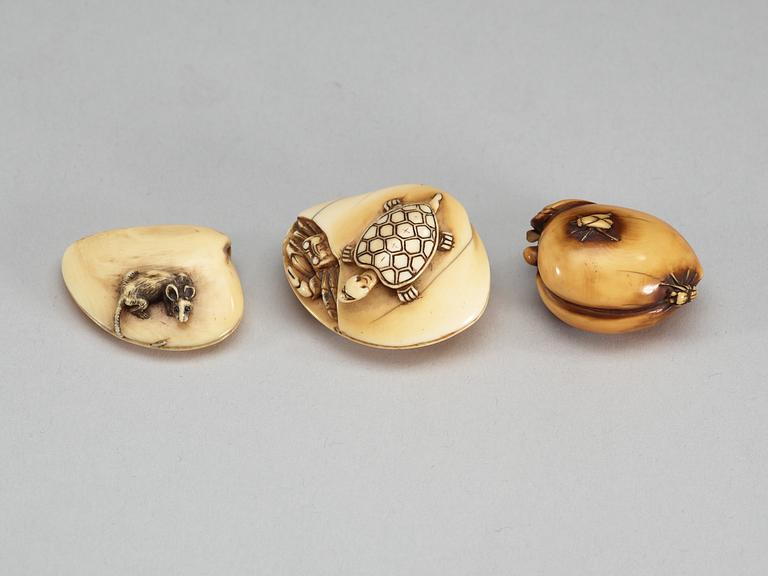 A set of eight Japanese ivory and bone Netsukes, Meiji period.