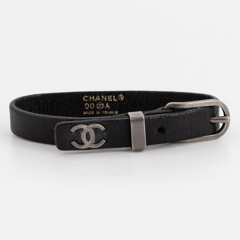 CHANEL, a leather bracelet.