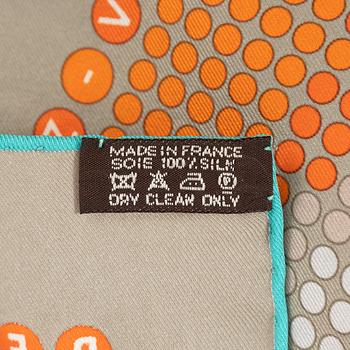 Hermès, a 'Rendez-Vous au 24' twill silk scarf.