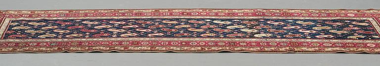 Matto, a runner, an antique Karabagh, ca 268,5-278 x 98,5-103,5 cm.