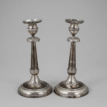 LJUSSTAKAR, ett par, silver, otydliga stämplar, troligen Finland, 1800-tal.
