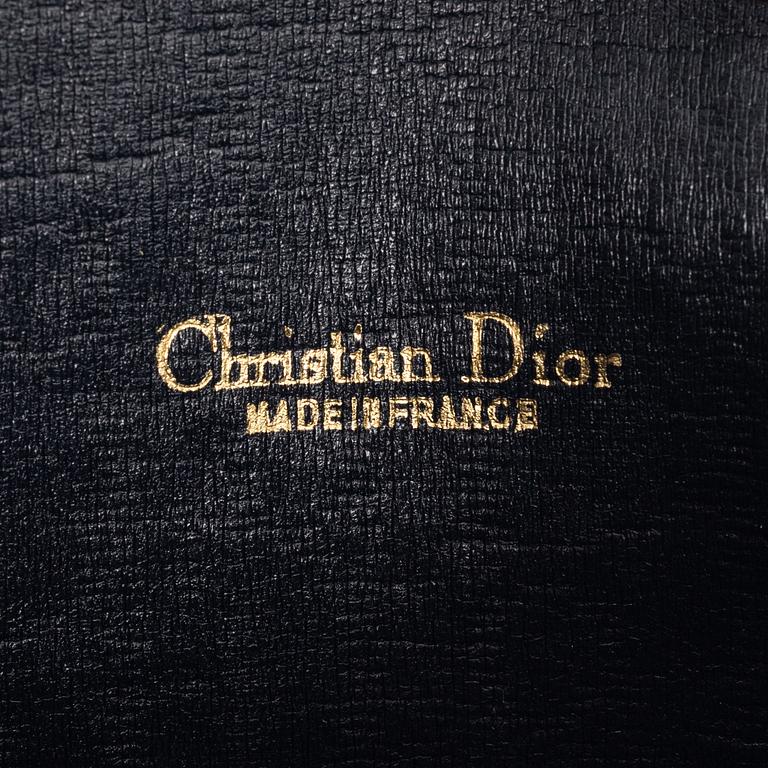 Christian Dior, bag and scarf.
