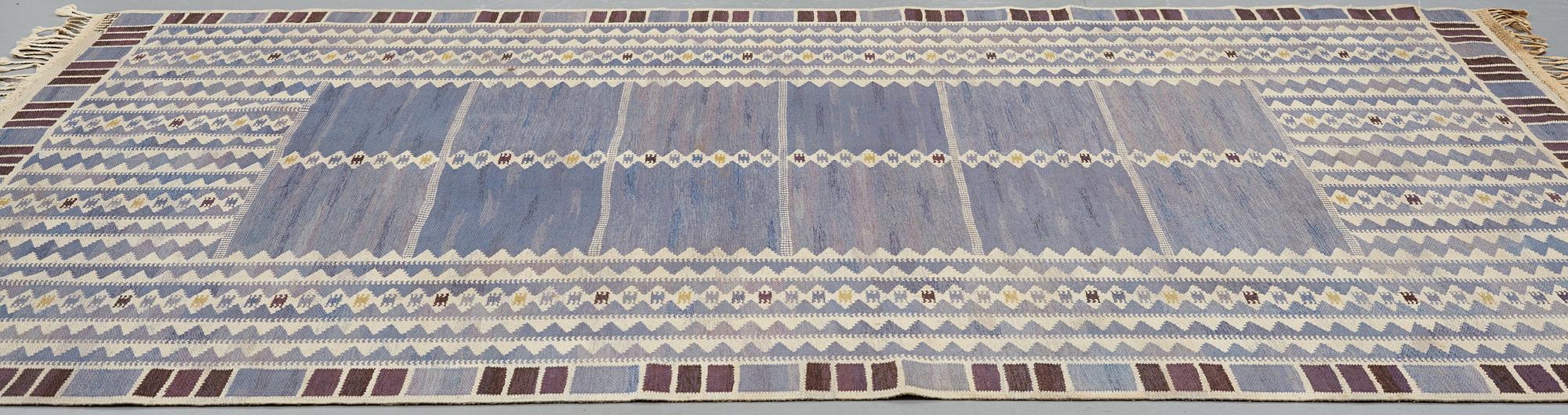Barbro Nilsson, a carpet, "Salerno blå", flat weave, ca 312 x 201,5-205,5 cm, signed AB MMF BN.