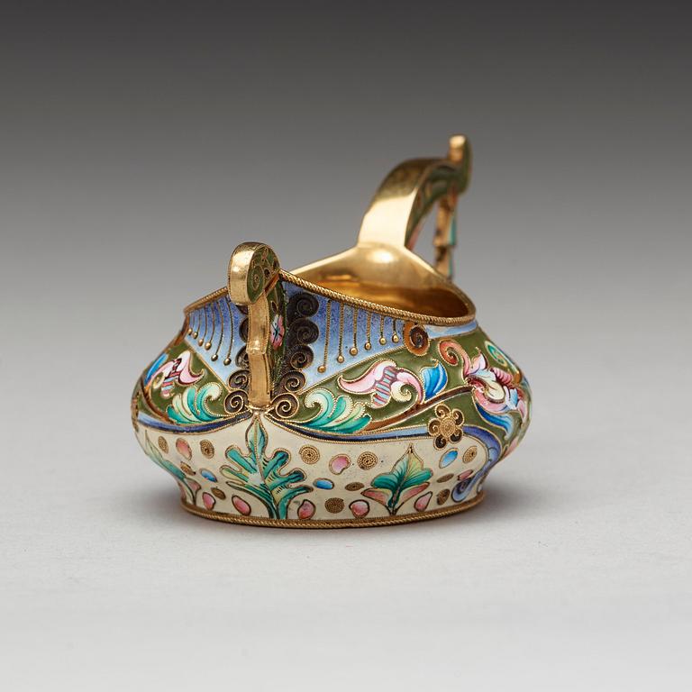 A Russian 20th century silver-gilt and enamel kovsh, marks of the 20th Artell, Moscow 1908-1917.