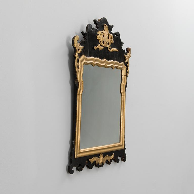 An 18th century rococo mirror.