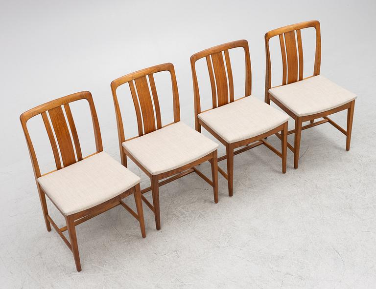 Four walnut chairs, AB Linde Nilsson, Lammhult, Sweden, second half of the 20th century.