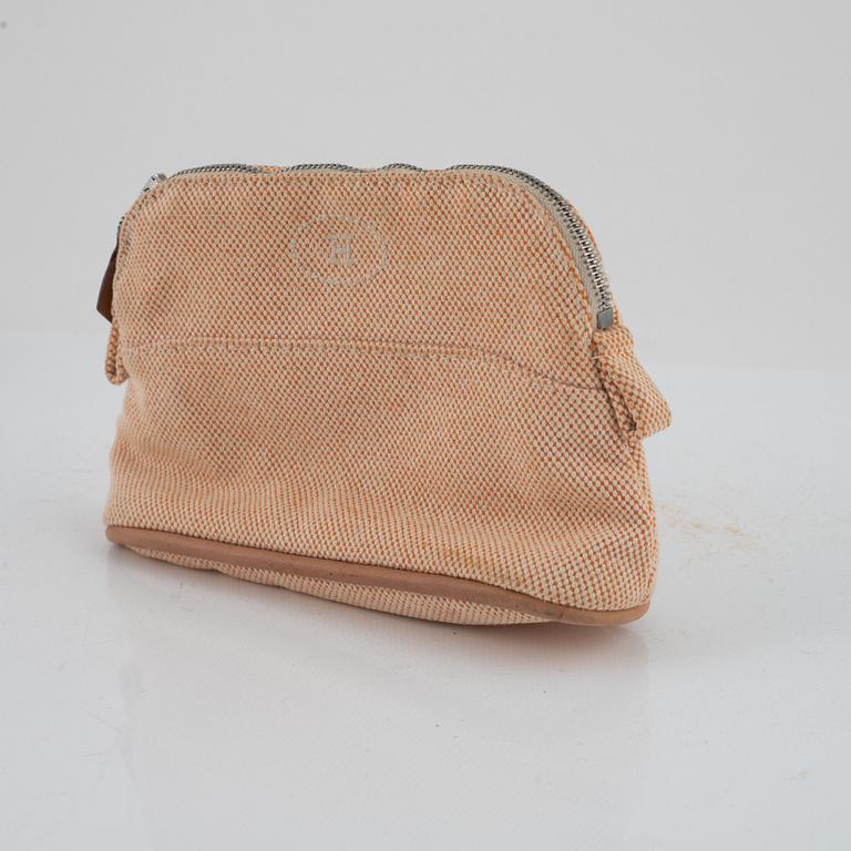 Hermès, "Fourre tout PM" bag and toiletry bag.