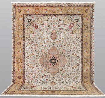A part silk Tabriz carpet, so-called 50 Radj, c. 348 x 252 cm.