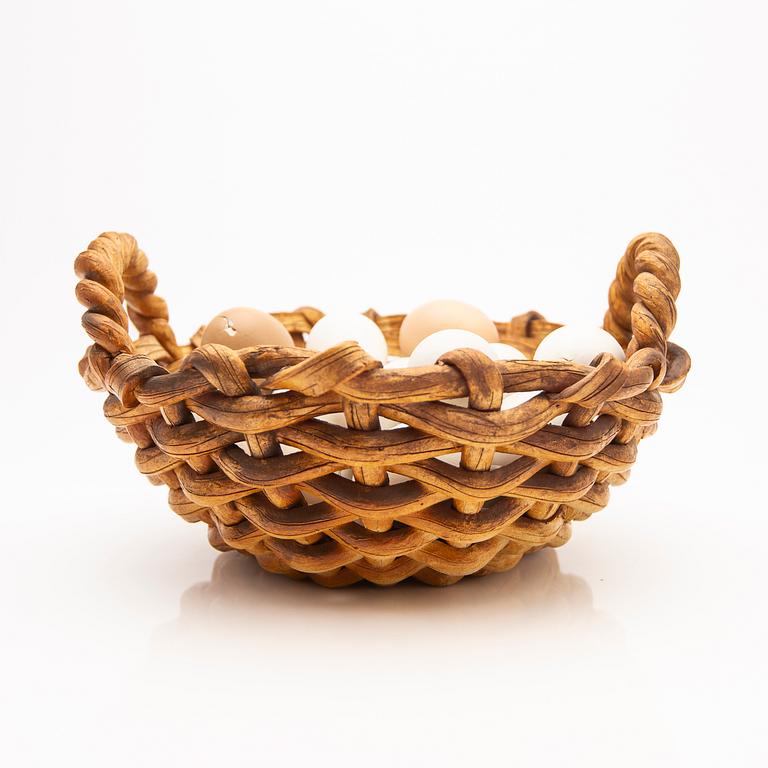 Ingrid Herrlin, basket with eggs, stoneware.