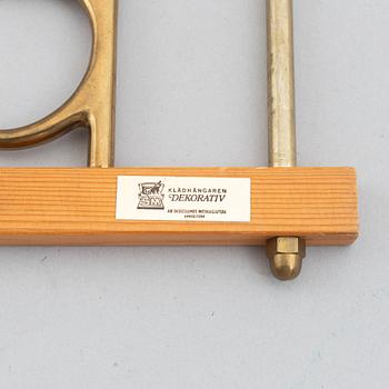 A pair of 'Dekorativ' coat hangers, Skoglunds metallgjuteri, Anderstorp, 1950's/60's.