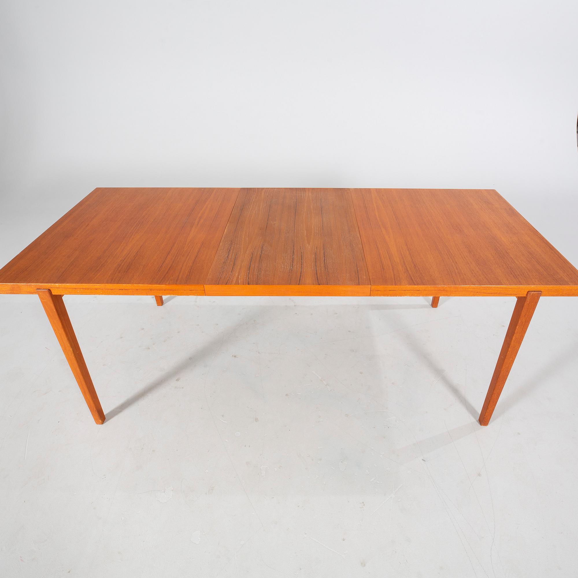 A mid 20th century dining table.