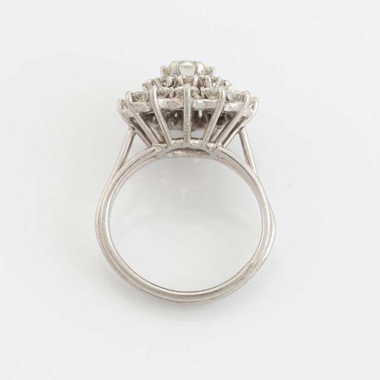 Brilliant cut diamond cluster ring.