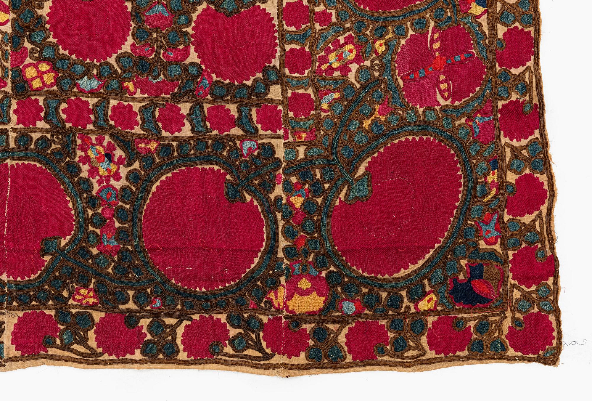 An antique Suzani embroidery, probably Tashkent region, Uzbekistan, 19th century, c. 221 x 184 cm.