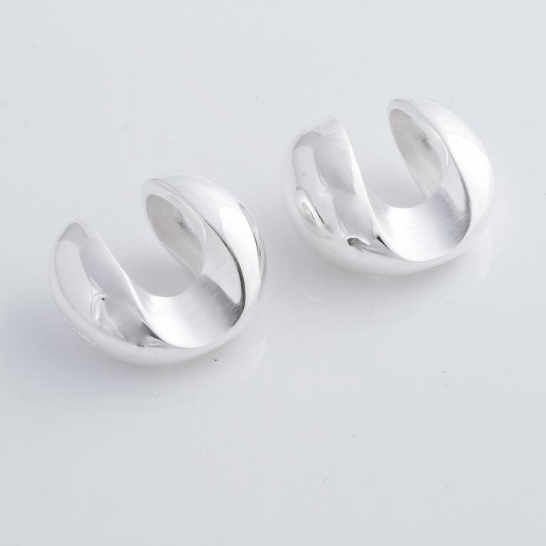 A pair of cufflink, by Ole Lynggaard.