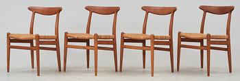 A set of four Hans J Wegner teak and rattan chairs, CM Madsen, Denmark 1950's-60's.