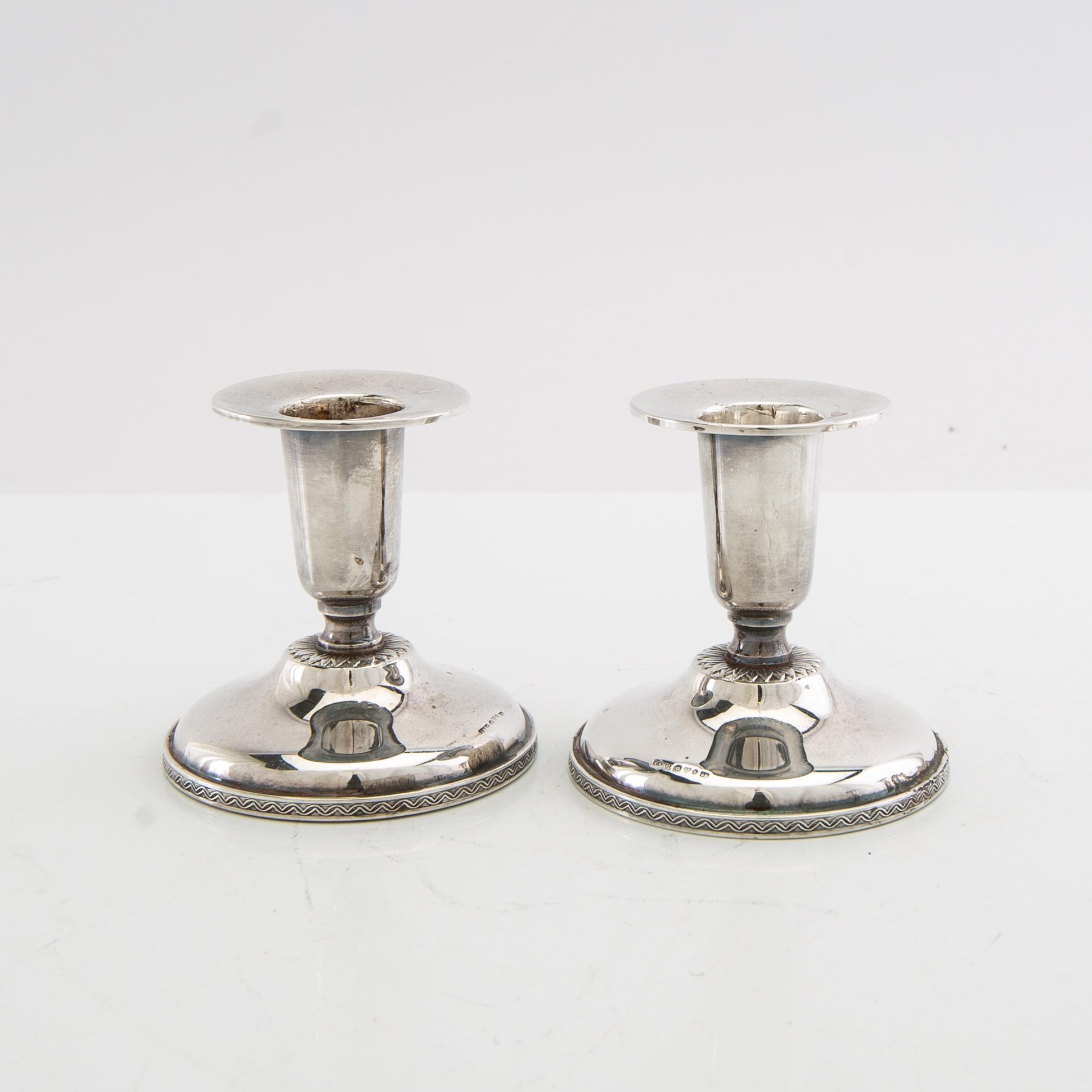 Ljusstakar 2 par silver MGAB Uppsala 1960 samt K&EC Göteborg 1964.