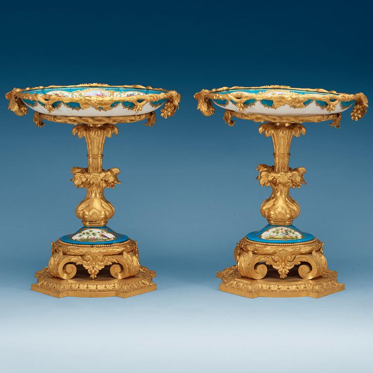 A pair of French porcelain and gilt bronze centrepieces, 18th and late 19th Century 'Sèvres'.